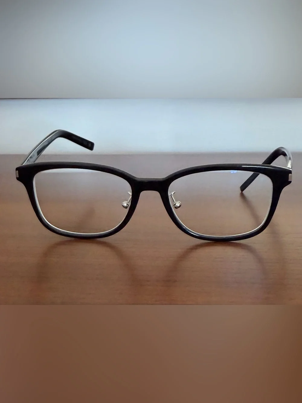 Saint Laurent Black Frames with Blue-Tinted Lenses